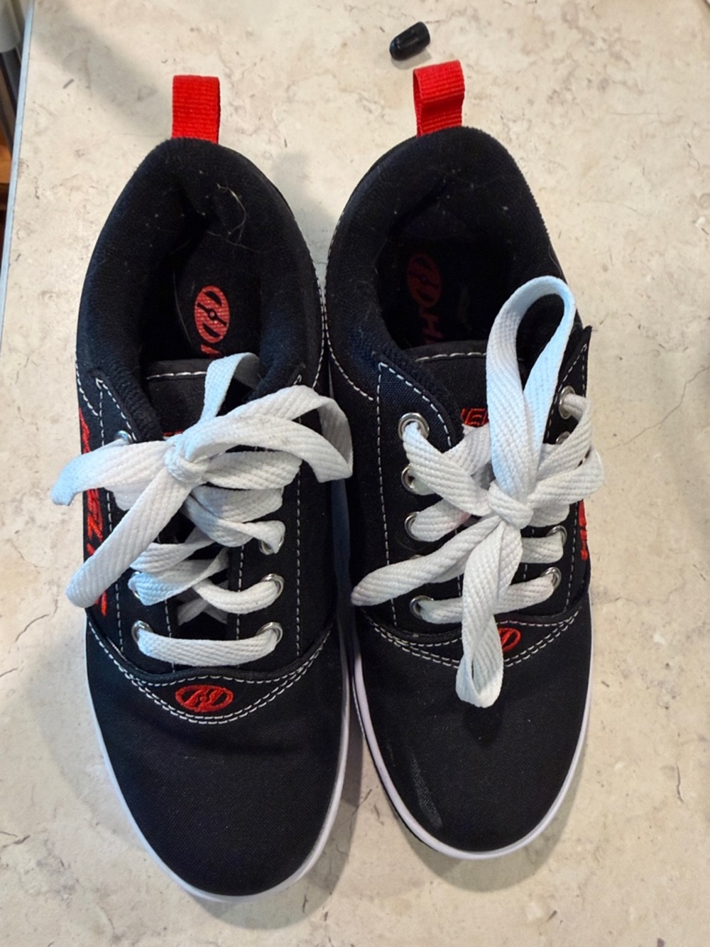 Heelys Black Sneakers with White Laces and Red Pull Tabs